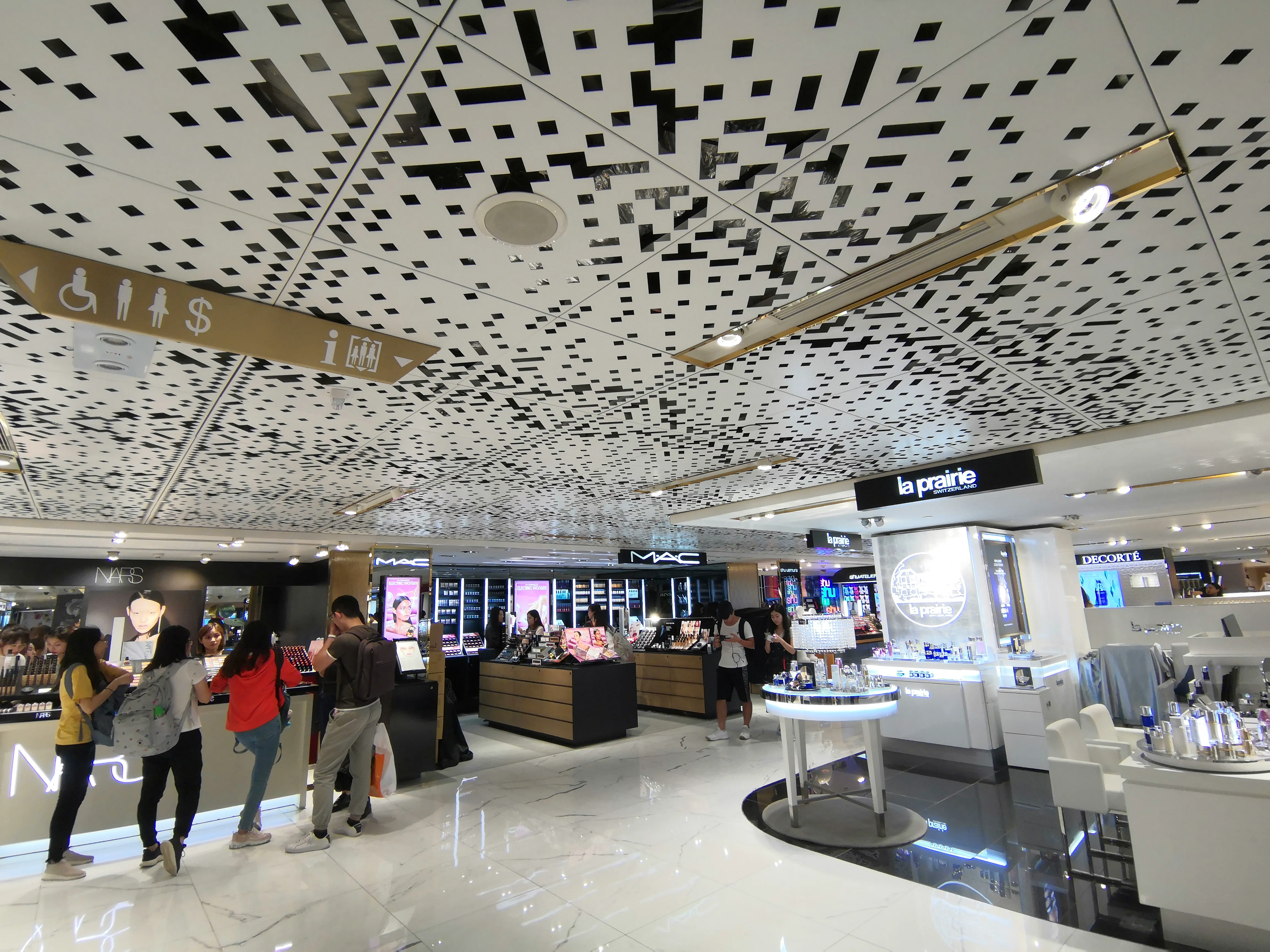 Perforated ceiling detail in a retail interior
